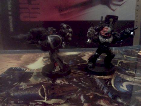 Iron Hands Devastator Sgt. and Lascannon Marines by MurderMachine