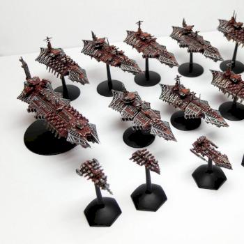 Battlefleet Gothic Chaos fleet with asteroids by sparrowhawk2k